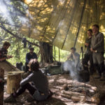 Bushcraft lesson under parachute