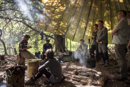 Bushcraft lesson under parachute