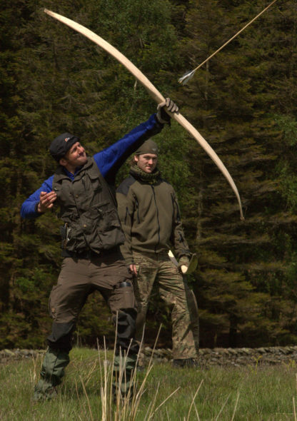 Bowyer shooting an arrow