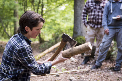 bushcraft instructor with axe