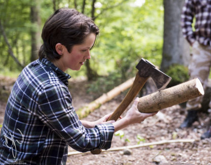 Bushcraft Instructor Heather splitting with Axe