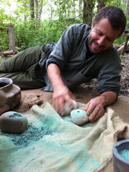 Fergus Drennan pounding malachite